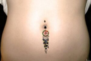 tatuaje para tapar cicatriz de cesárea vertical